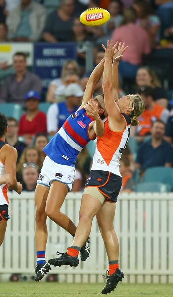 SLIDER-AFLWMRrd6.jpg GIANTS forward Cora Staunton flies for a mark. - AFLW,GWS Giants,UNSW Canberra Oval,Western Bulldogs